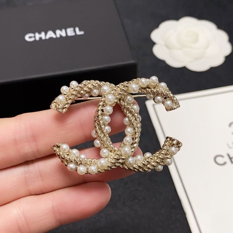 Ch*el brooches